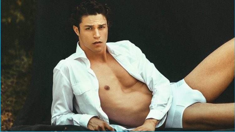 Miles McMillan sports an Ermenegildo Zegna Couture open shirt with a Springfield swimsuit.