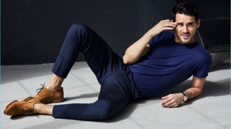 Greg Vaughan photographs Arthur Kulkov in Between Rivers' asymmetrical cap toe oxford shoes in caramel suede.