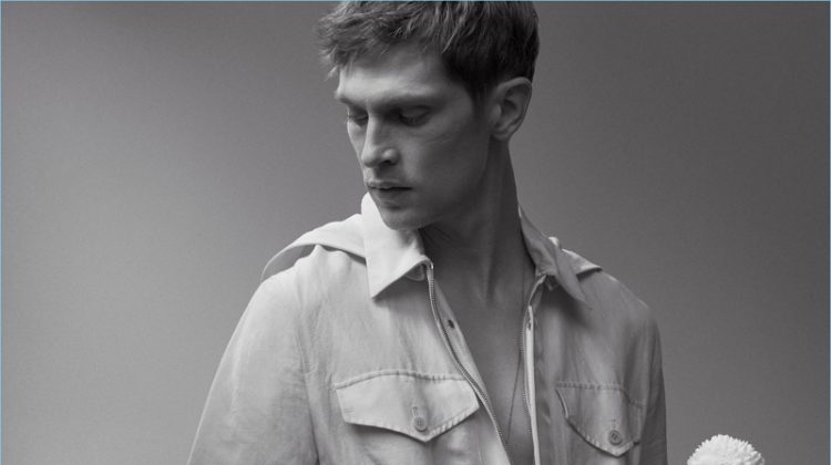 Mathias Lauridsen dons a J.W. Anderson jumpsuit with a Title of Work necklace.