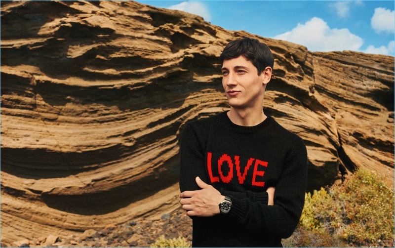 Nicolas Ripoll sports a "LOVE" sweater for Fendi's fall-winter 2017 men's campaign.