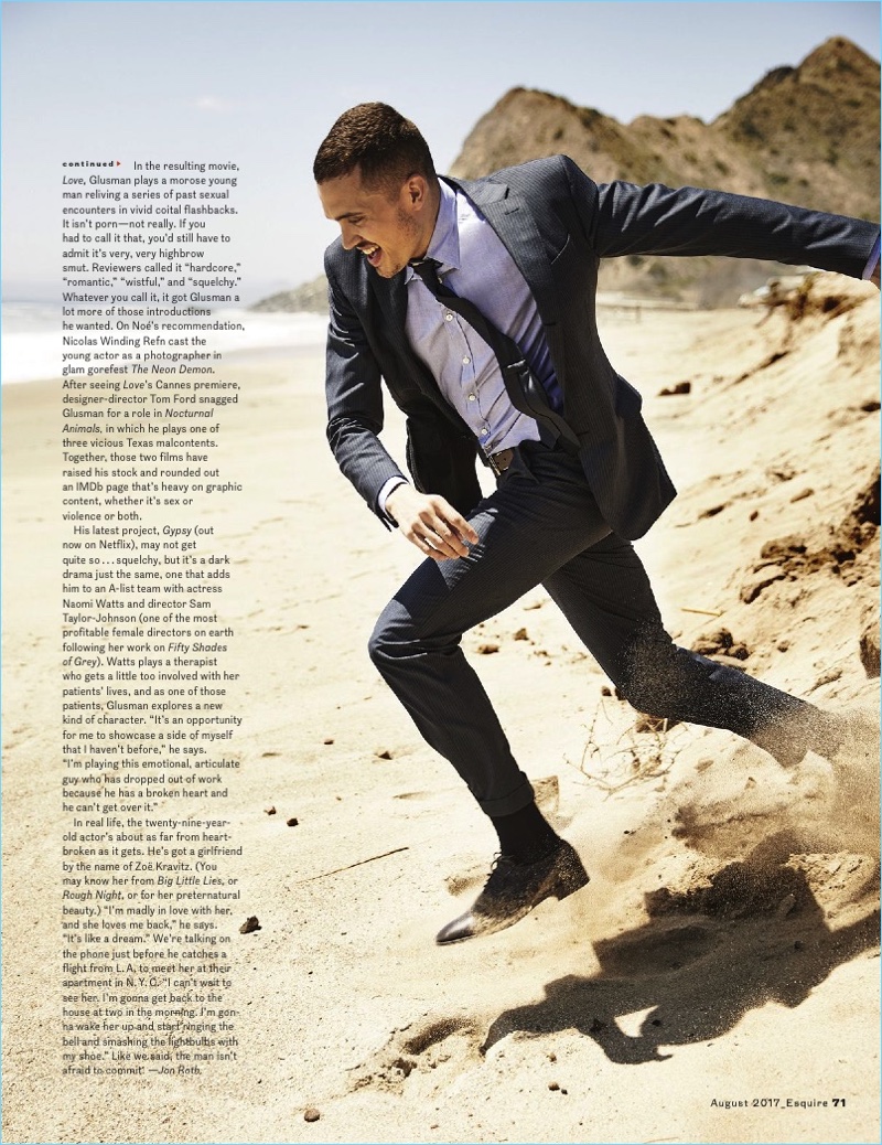 Bringing a little energy to his Esquire shoot, Karl Glusman wears an Ermenegildo Zegna suit.