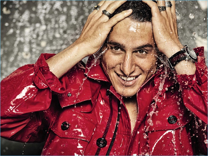 Making a statement in red, Leonardo Fioravanti sports a Moncler jacket.