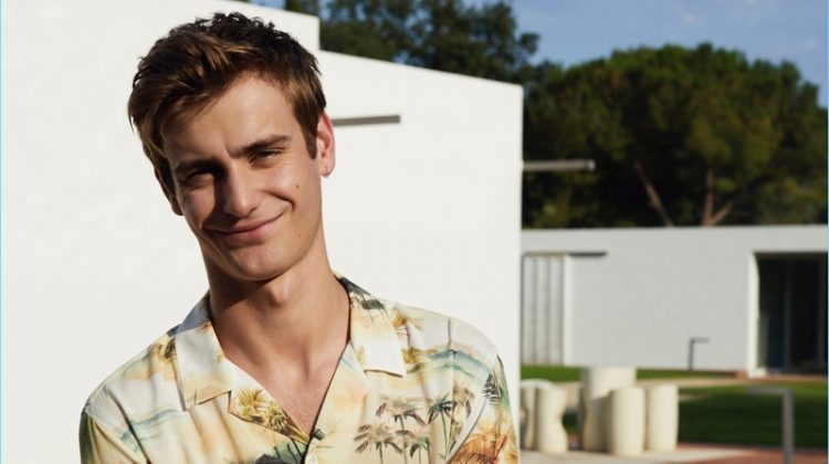 All smiles, Ben Allen wears a summery print shirt from Mango Man.