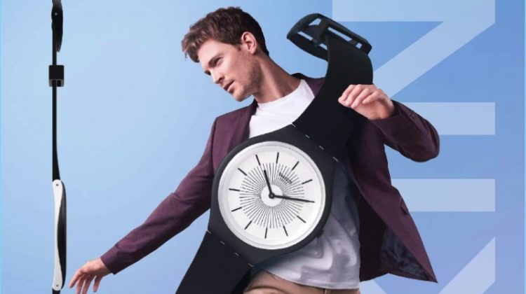 An advertising image featuring the Swatch SKIN watch.