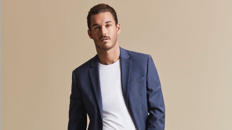 Making a case for the t-shirt and suit look, David Alexander Flinn appears in Express' fall 2017 campaign.