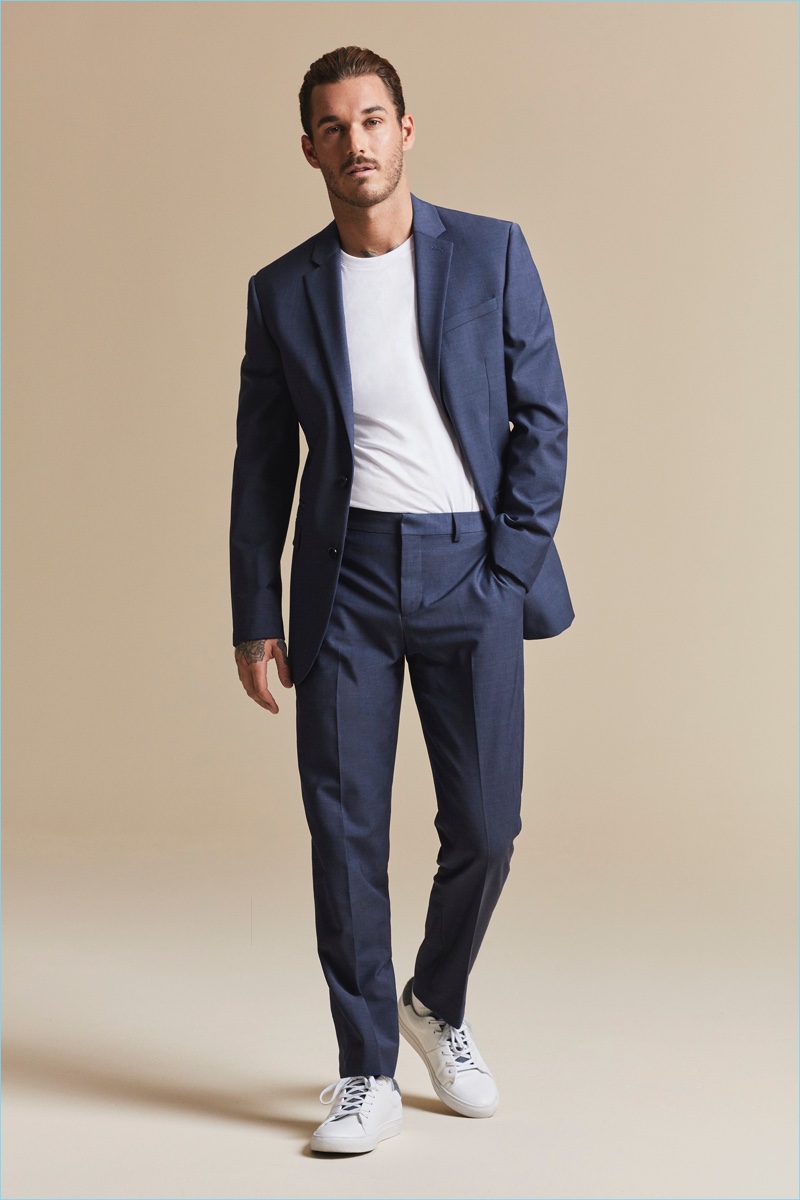 Making a case for the t-shirt and suit look, David Alexander Flinn appears in Express' fall 2017 campaign.