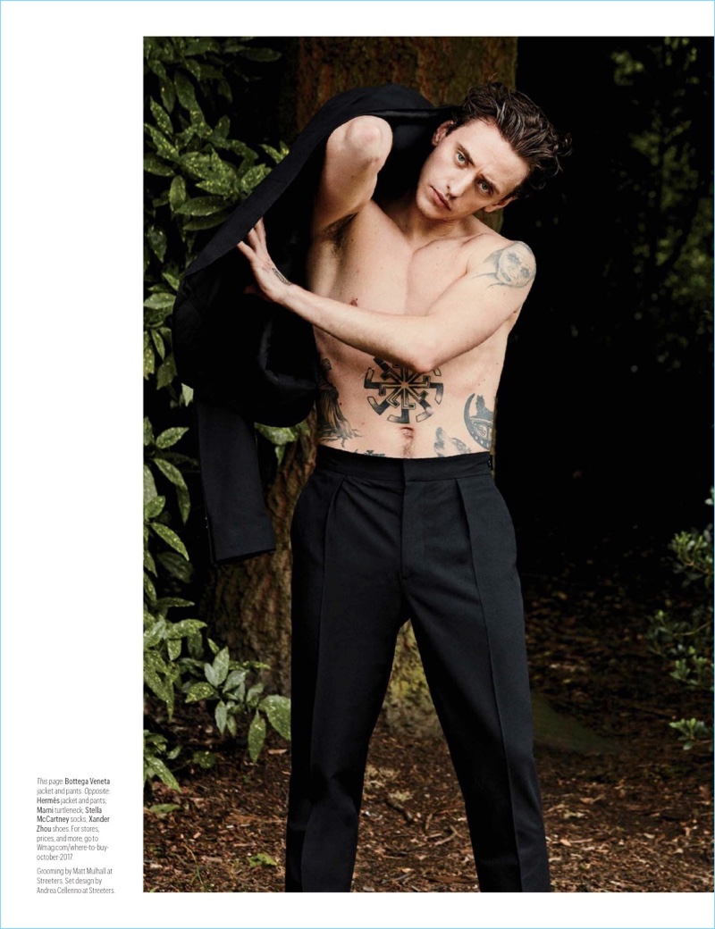 Showing off his tattoos, Sergei Polunin wears a Bottega Veneta suit.