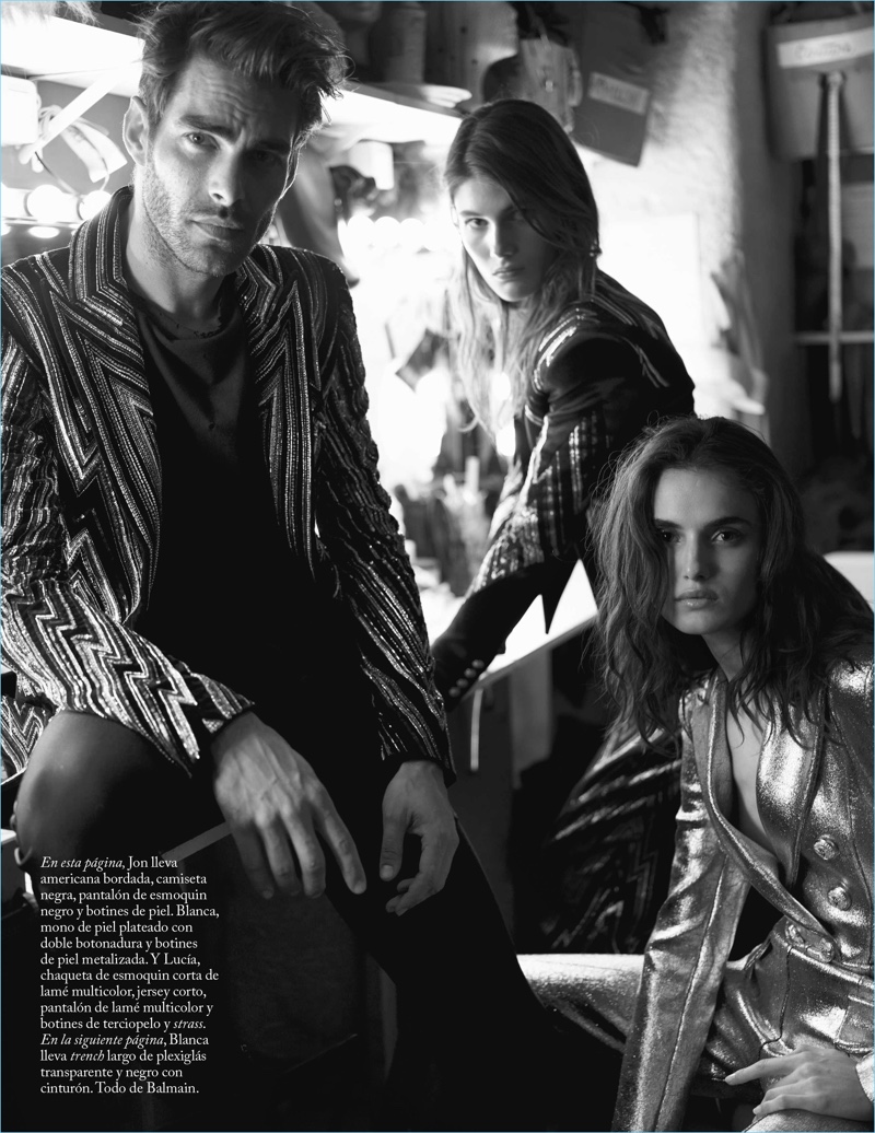 Models Jon Kortajarena, Lucia Lopez, and Blanca Padilla wear Balmain.