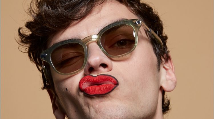 Making a silly face, Xander Weber wears Monumental by Karen Walker Klee Green sunglasses.