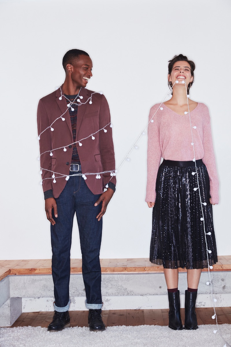 All smiles, Oliver Kumbi and Margot Davy front Esprit's holiday 2018 campaign.