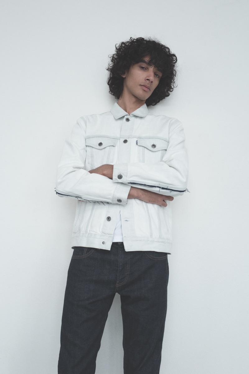 Front and center, Callum Stoddart sports a denim jacket and jeans from Levi's Made & Crafted.