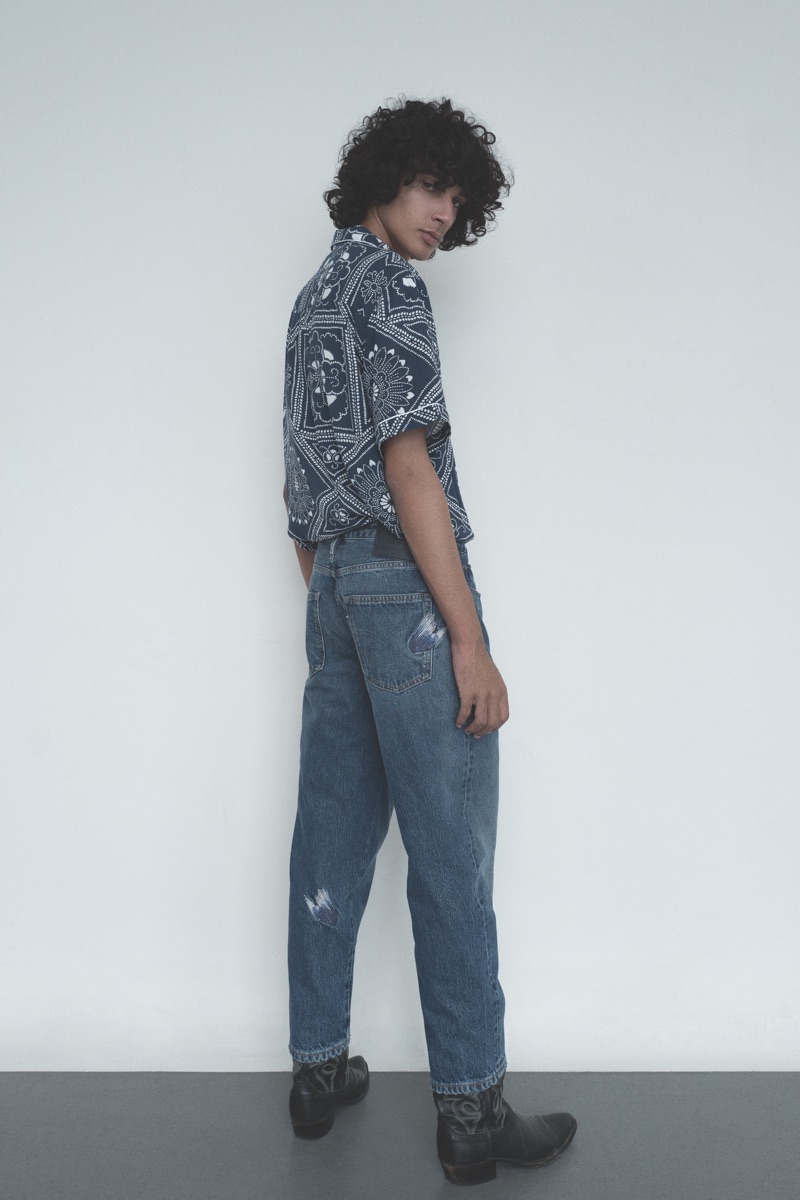 Sporting a bandana print shirt, Callum Stoddart wears Levi's Made & Crafted collection.