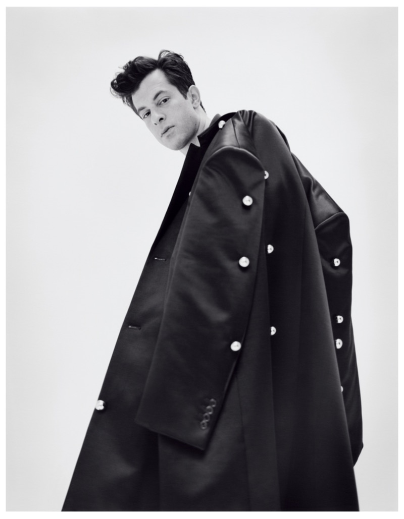 Sporting a Raf Simons coat, Mark Ronson appears in a photo shoot.