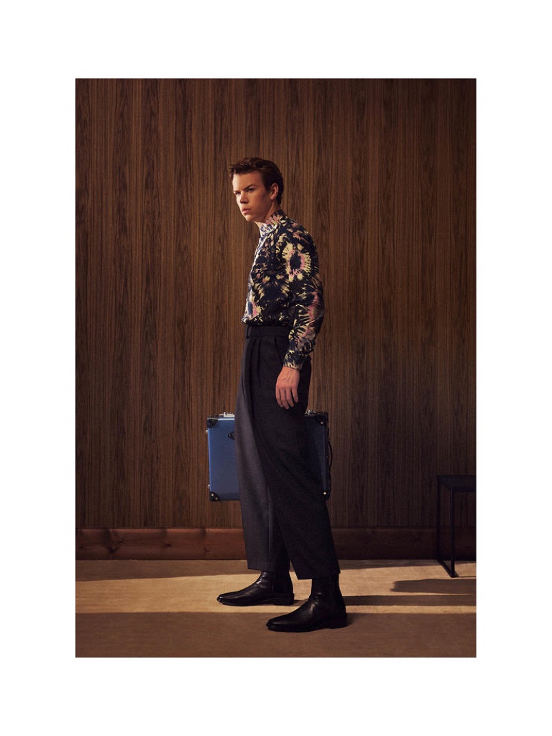 Showcasing designer fashions, Will Poulter wears a DRIES VAN NOTEN shirt £325 and trousers £475; GLOBE-TROTTER Deluxe trolley case £2,110; PIERRE HARDY boots £715.