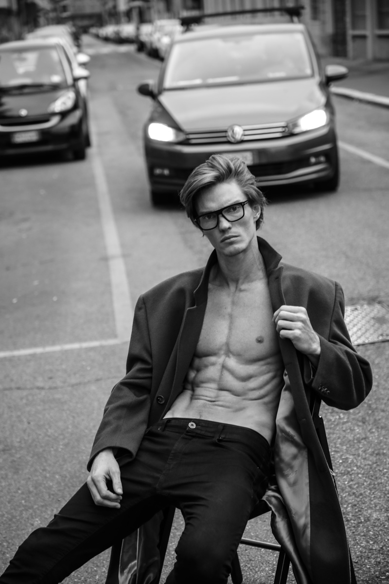 Taking to the streets of Milan, Bruno Novodvorski poses for a portrait.