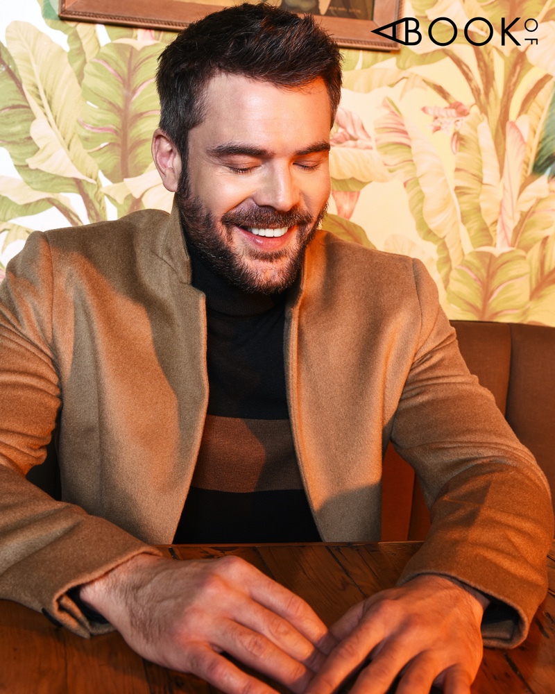 All smiles, Charlie Weber dons a fall look for the pages of A Book Of magazine.