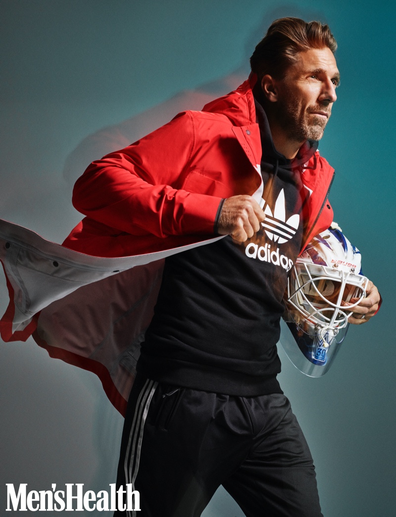 Henrik Lundqvist sports a Canada Goose seawolf jacket with an Adidas trefoil hoodie, and Y-3 STP stir-up track pants.