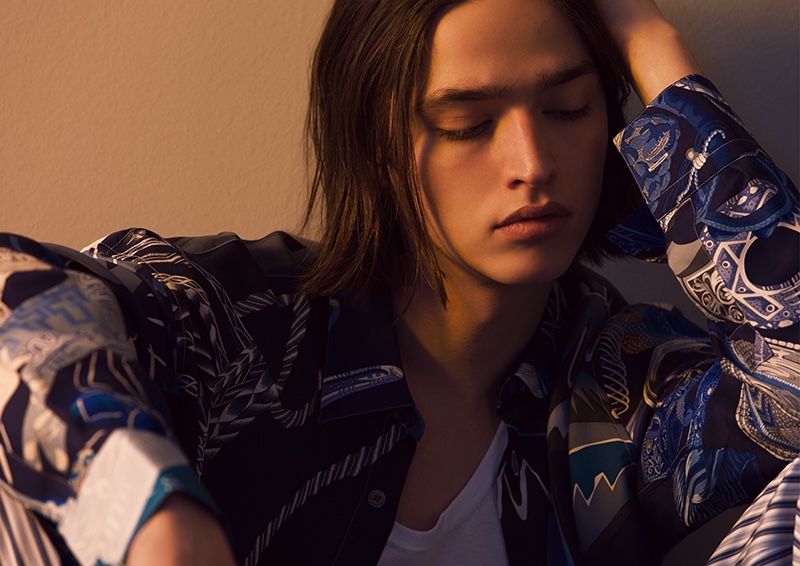 Mixing patterns, Maël dons sleek pieces from Hermès' spring-summer 2020 collection.