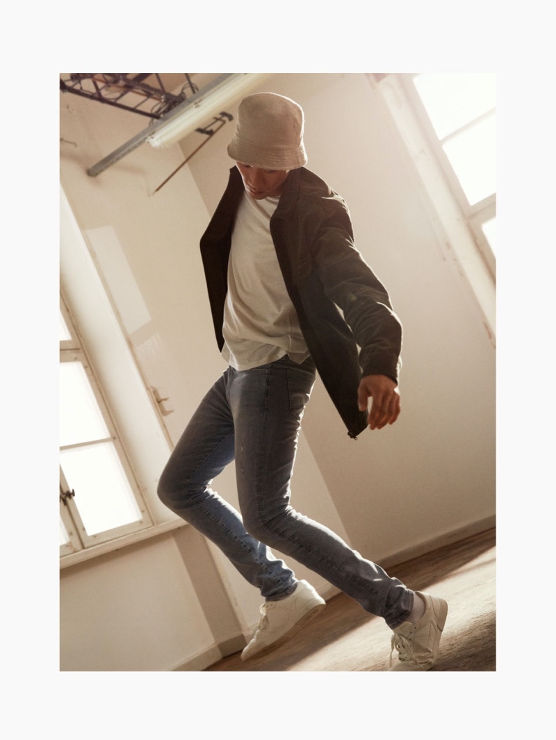 Showing off his best moves, Kamui Tanaka sports H&M's Freefit skinny jeans.