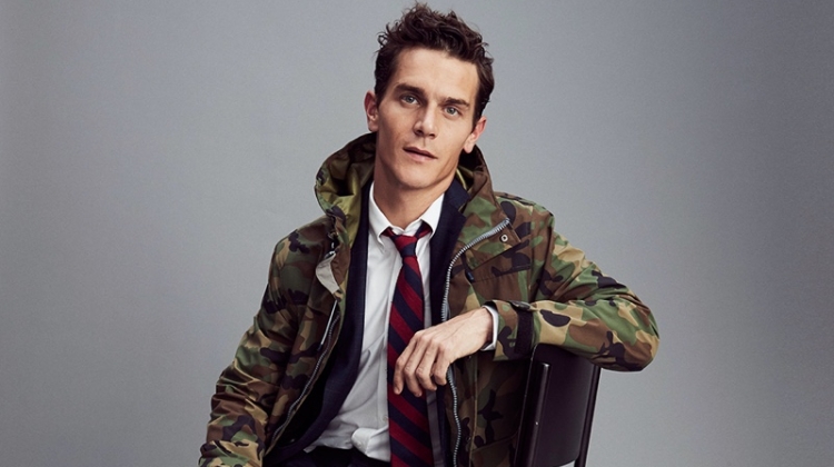 Vincent LaCrocq jazzes up a dapper J.Crew suit with a camouflage jacket.