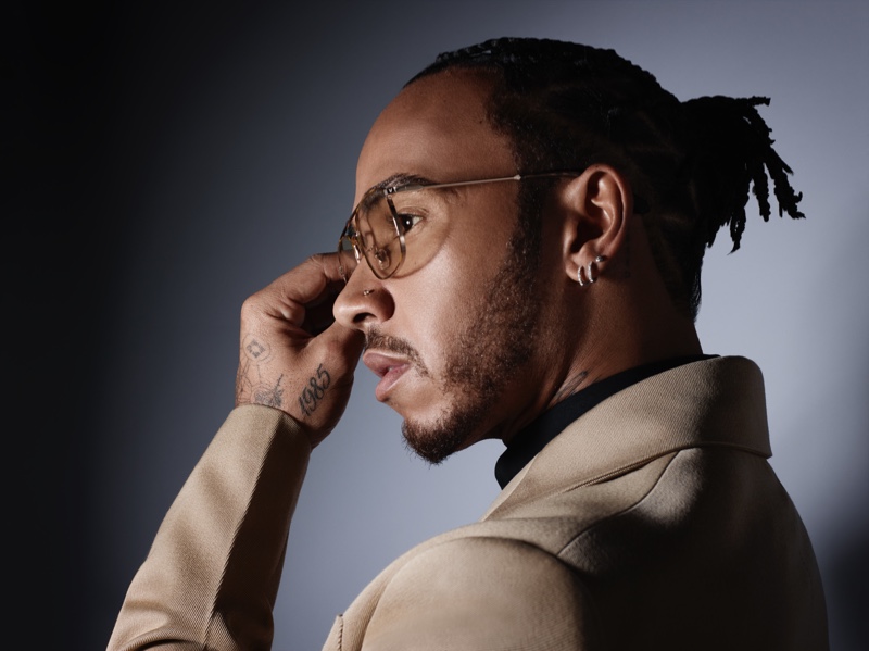 Rankin photographs Lewis Hamilton in a Prada coat and Police eyewear for Corriere della Sera Style.