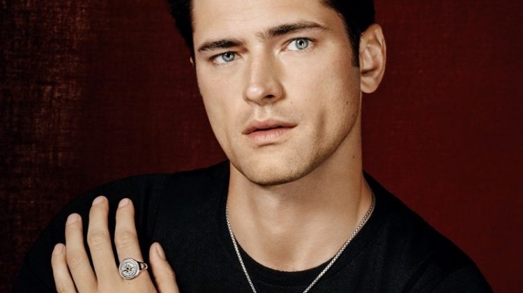 Front and center, Sean O'Pry dons a David Yurman box chain silver necklace, Hamsa silver amulet, and skull silver amulet. He also sports a maritime anchor silver amulet and compass silver signet ring with a modern cable silver cuff bracelet. Layering for the Holt Renfrew shoot, Sean is pictured in David Yurman's maritime anchor leather wrap bracelet with silver and streamline silver link bracelet as well.