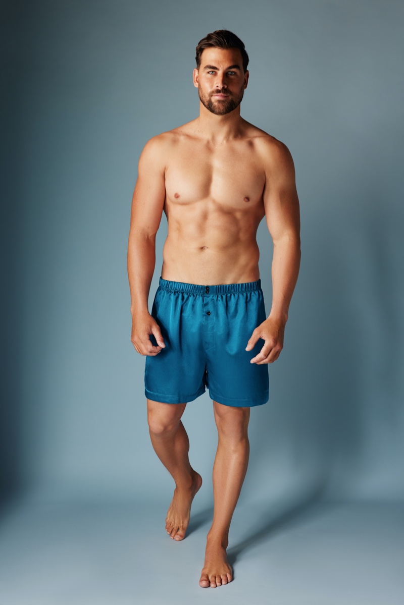 Donning Frederick's of Hollywood, Marc Jacobs wears its satin men's boxers.