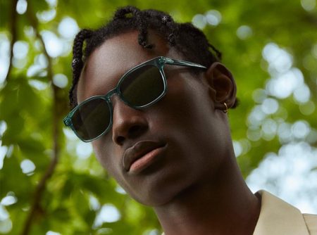 Warby Parker enlists model Youssouf Bamba to wear its colorful Hemmings sunglasses in Viridian.