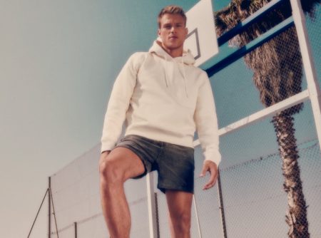 Rocking the brand's white sneakers, Matthew Noszka stars in CCC Sprandi's fall 2021 campaign.