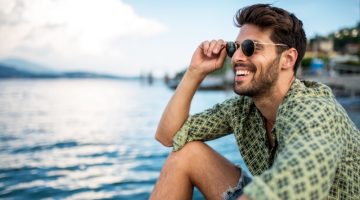 Man Smiling by Sea