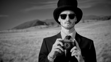 Man Vintage Style Top Hat Sunglasses Camera