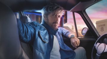 The TAG Heuer "The Chase for Carrera" campaign features Ryan Gosling donning a stylish blue leather jacket as he takes the wheel.