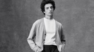 Gabriel Pitanga models a Brayden cashmere cardigan, authentic Supima t-shirt, and Signature Italian Hopsack wide-leg pants from the Banana Republic BR Classics collection.