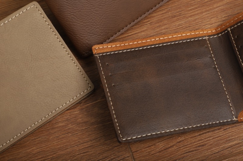 Compare how various leathers hold up over time to make an informed wallet choice.