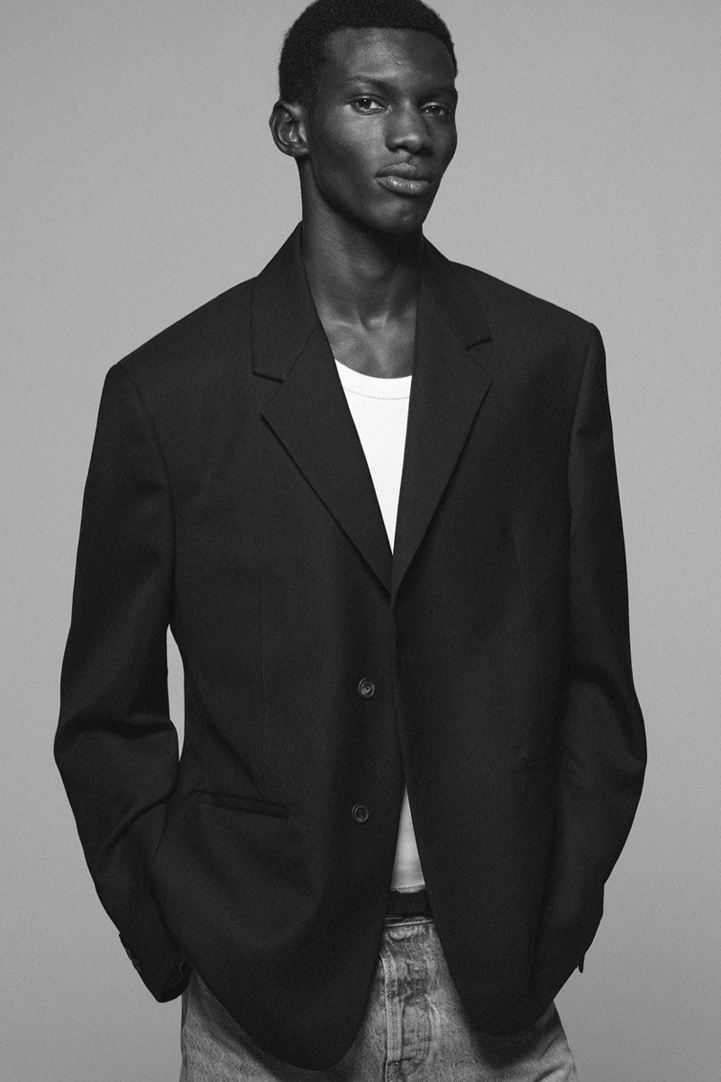 Model Momo Ndiaye wears a blazer and jeans from the Zara “90s Archive” collection.