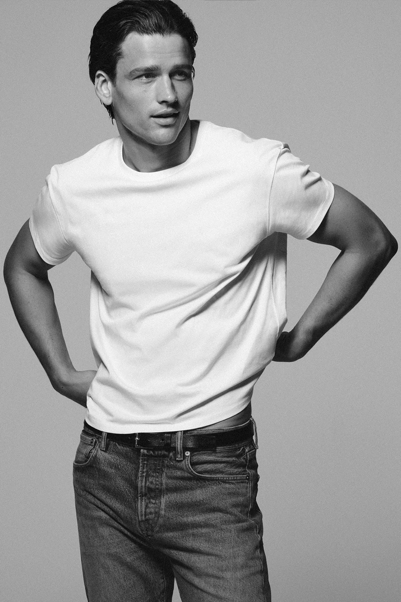 Top model Simon Nessman wears a white T-shirt and jeans from the Zara “90s Archive” collection.