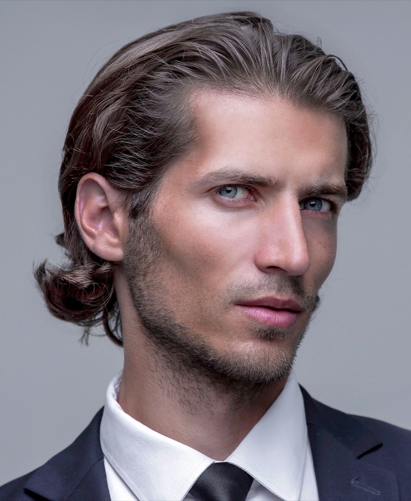 slick back wavy hairstyle men