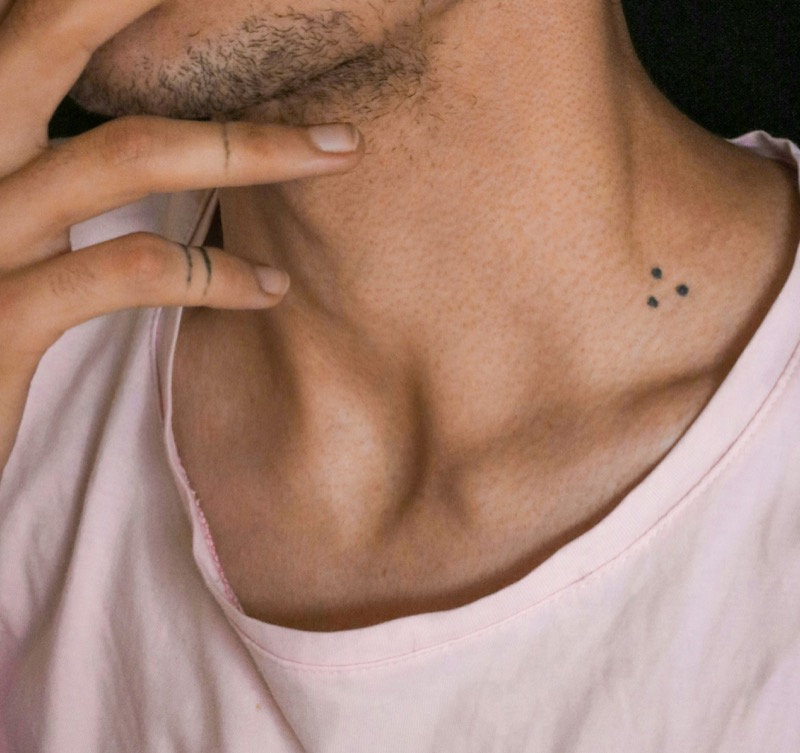 small minimalist neck tattoo dots