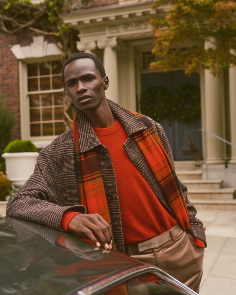 Festive in red, Malick Bodian fronts Banana Republic’s holiday 2024 advertisement.