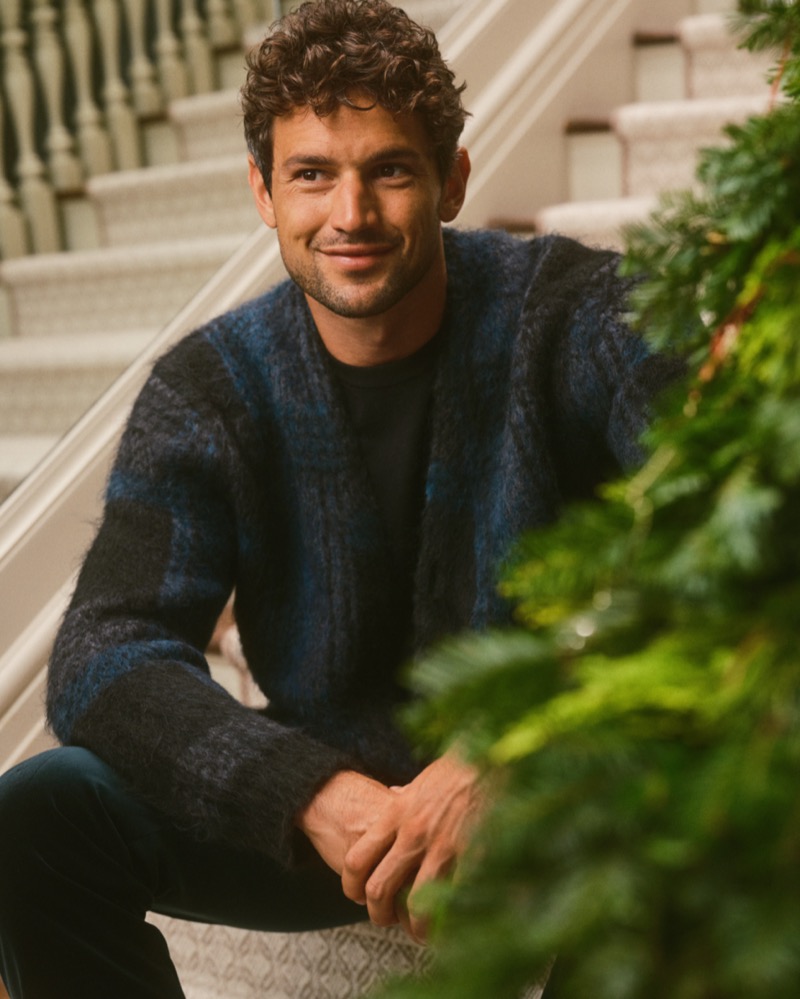 Model Giacomo Cavalli charms in a cardigan for Banana Republic’s holiday 2024 campaign.